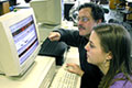 Lecturer discusses project results with student